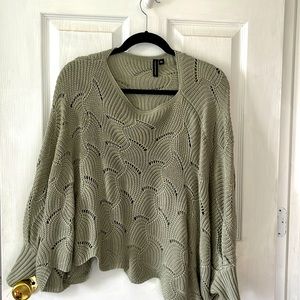 This green sweater is lose fitting and super comfy.